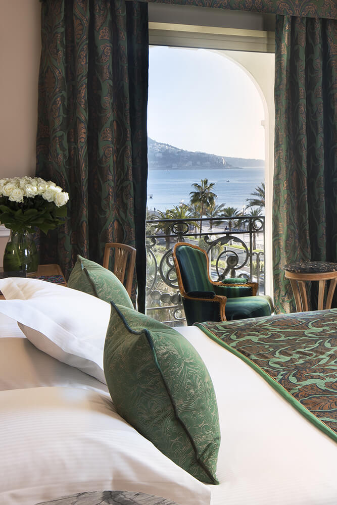 Le Negresco Luxury Hotel bed facing the sea 