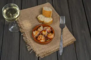 spanish octopus tapas with bread and white wine 2026 09 21 16 41 12 utc
